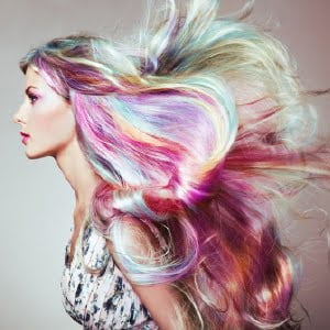 Beauty Fashion Model Girl with Colorful Dyed Hair. Girl with perfect Makeup and Hairstyle. Model with perfect Healthy Dyed Hair. Rainbow Hairstyles. Photo used for the fashion business.